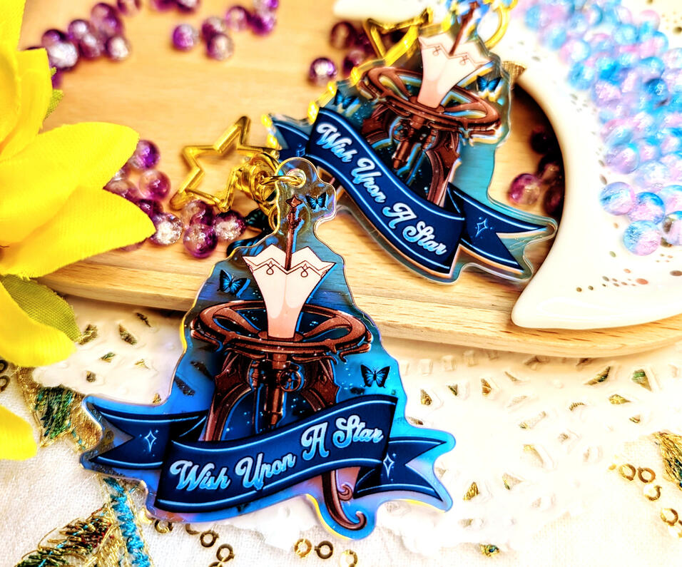 rainbow acrylic charm featuring a star gazer from the videogame Lies of p