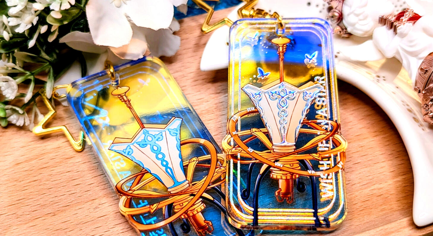 rainbow acrylic charm featuring a star gazer from the videogame Lies of p